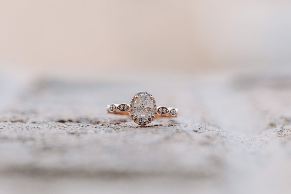 Close up of a rose gold engagement ring