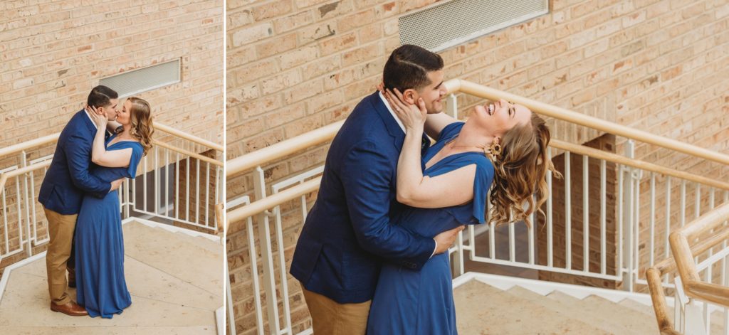 Woman in blue dress laughing with man in blue blazer during their engagement session at Fernbank