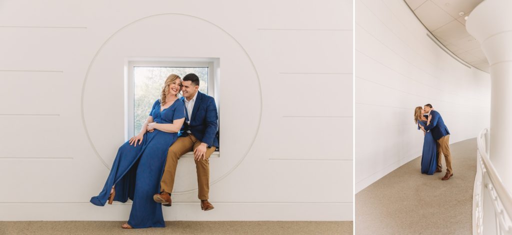 Man and woman laughing in front of a white wall at their Fernbank Engagement Session